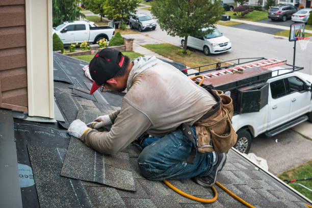 Professional Emergency Roof Repair technician working in Bennington, VT